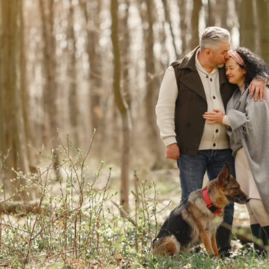Senior couple in the woods during healthy retirement